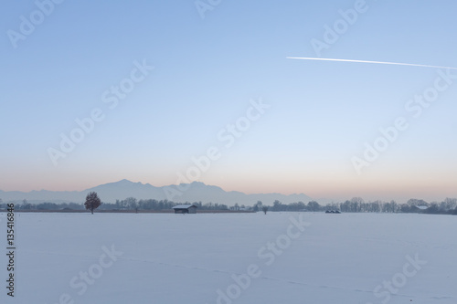 winter landscape in Bavaria at sunset near chiemsee