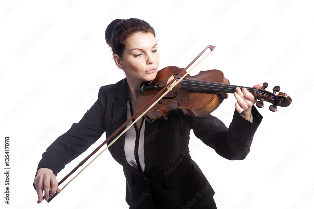 classical brunette beauty in suit plays the violin in studio classical brunette beauty in suit plays the violin in studio