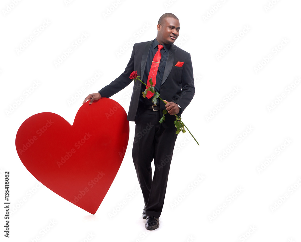 African man holding present to Valentine Day. African man holding present to Valentine Day.