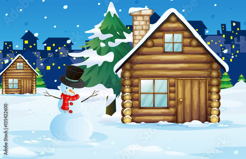 Wood cabin in the snow field