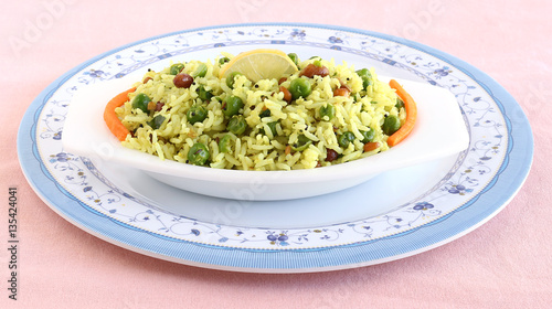 Indian vegetarian food lemon rice, a popular and traditional south indian dish in a plate.