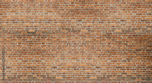 Old red brick wall vintage texture. Grunge stonewall background for text or image.