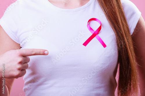 Wallpaper Mural Pink ribbon on woman chest to support breast cancer cause Torontodigital.ca
