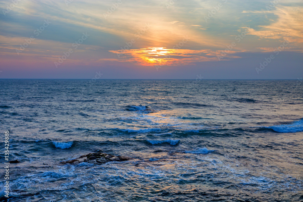 Obraz premium Sunset on tropical coastline