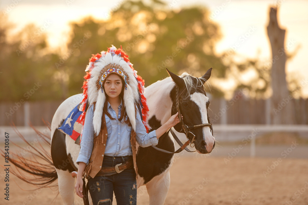 Beautiful womam sensuality elegance woman cowgirl on during sunset, Portrait nature. People and animals. Equestrian. vintage style
