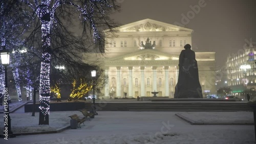 Winter snow in Russia at night: Bolshoi Theatre in Moscow