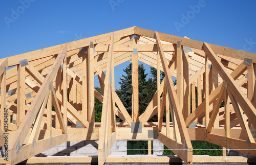 Roof trusses. Roofing Construction House Roof Building.Timber roofing trusses construction.