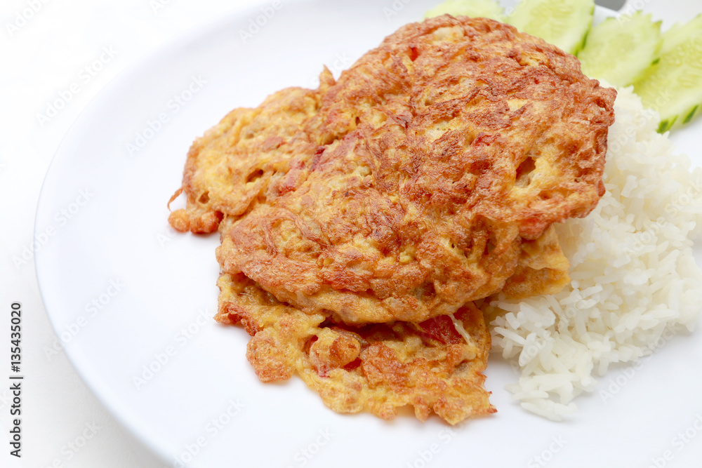 Omelet served with jasmine rice in white dish isolated on white background Omelet served with jasmine rice in white dish isolated on white background