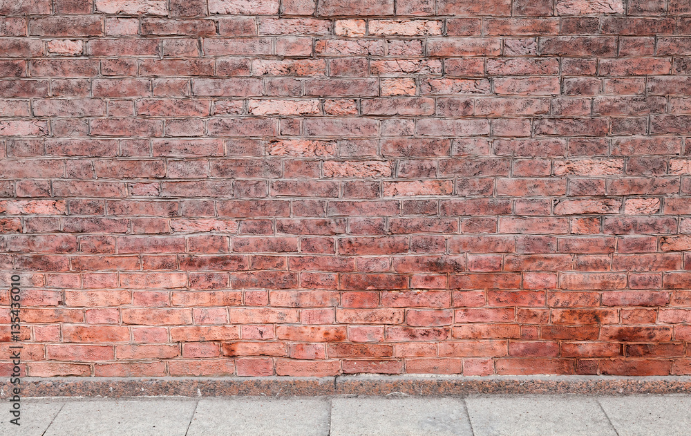 Fototapeta premium Red brick wall and concrete floor