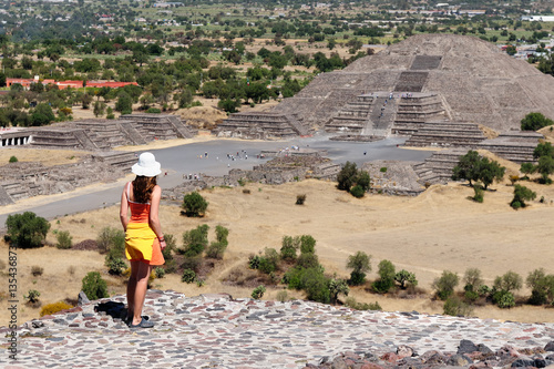 Tourist touring Teotihuacan ruins in Mexico