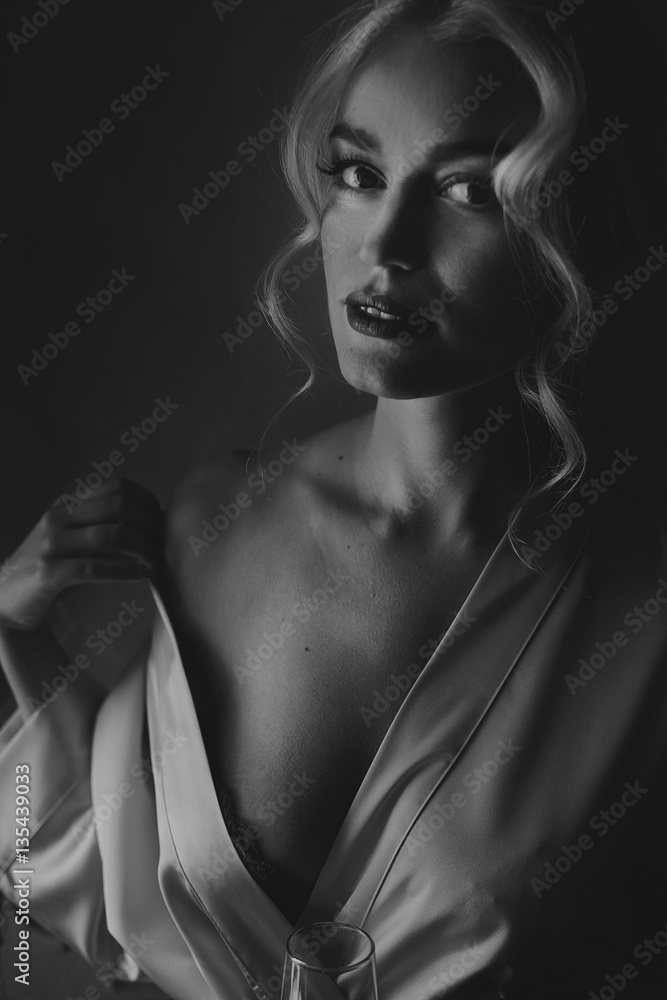 Seductive blonde lady takes off her silk robe Seductive blonde lady takes off her silk robe