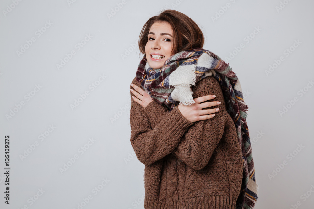 Young Freeze woman in sweater and scarf Young Freeze woman in sweater and scarf