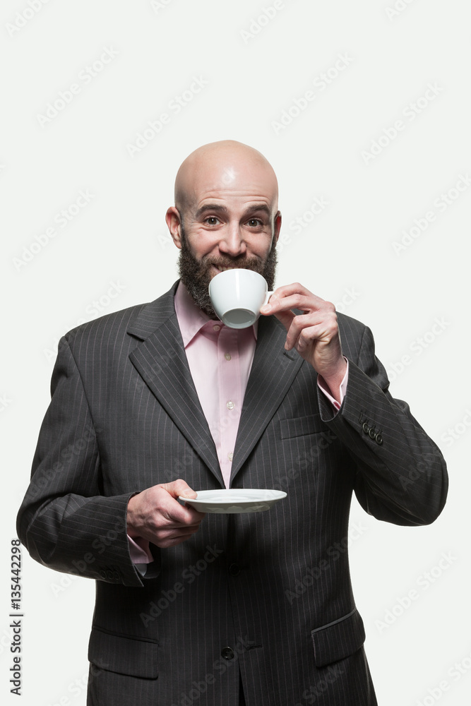 Man drinks a cup of coffee Man drinks a cup of coffee