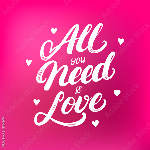 All you need is love hand written lettering with hearts.