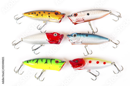 Set of fishing lures isolated on white. Wobblers in three color. Green, yellow and red colors.