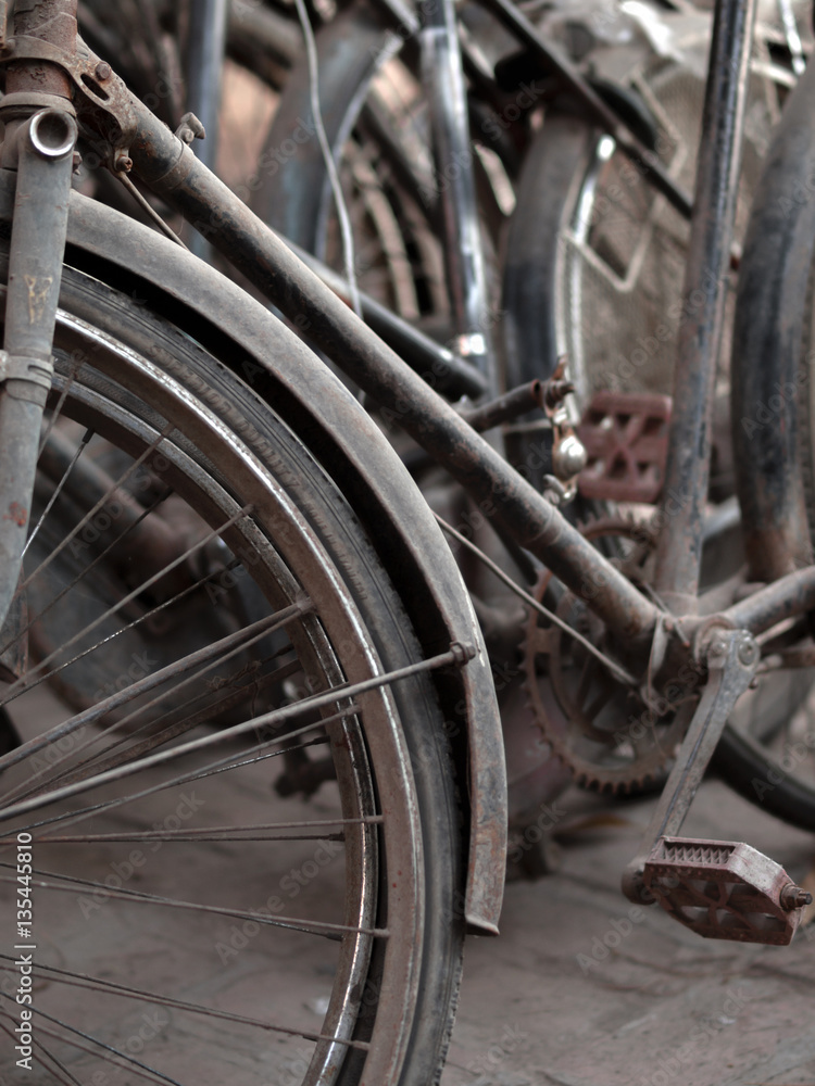 ABSTRACT SHOT OF OLD RUSTY BICYCLE PARTS