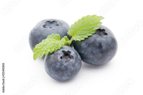 Group of fresh juisy blueberries isolated on white background. photo