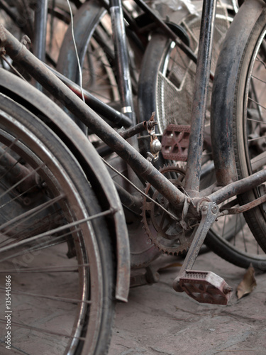 ABSTRACT SHOT OF OLD RUSTY BICYCLE PARTS