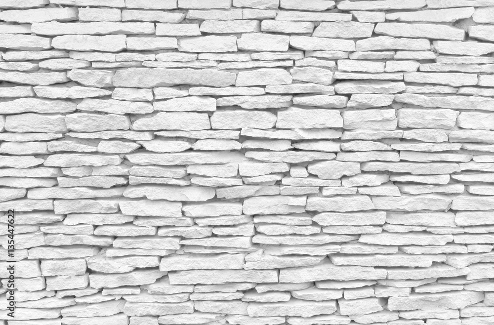 Obraz premium Texture of white and grey stone wall