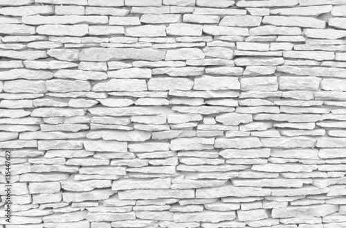 Texture of white and grey stone wall