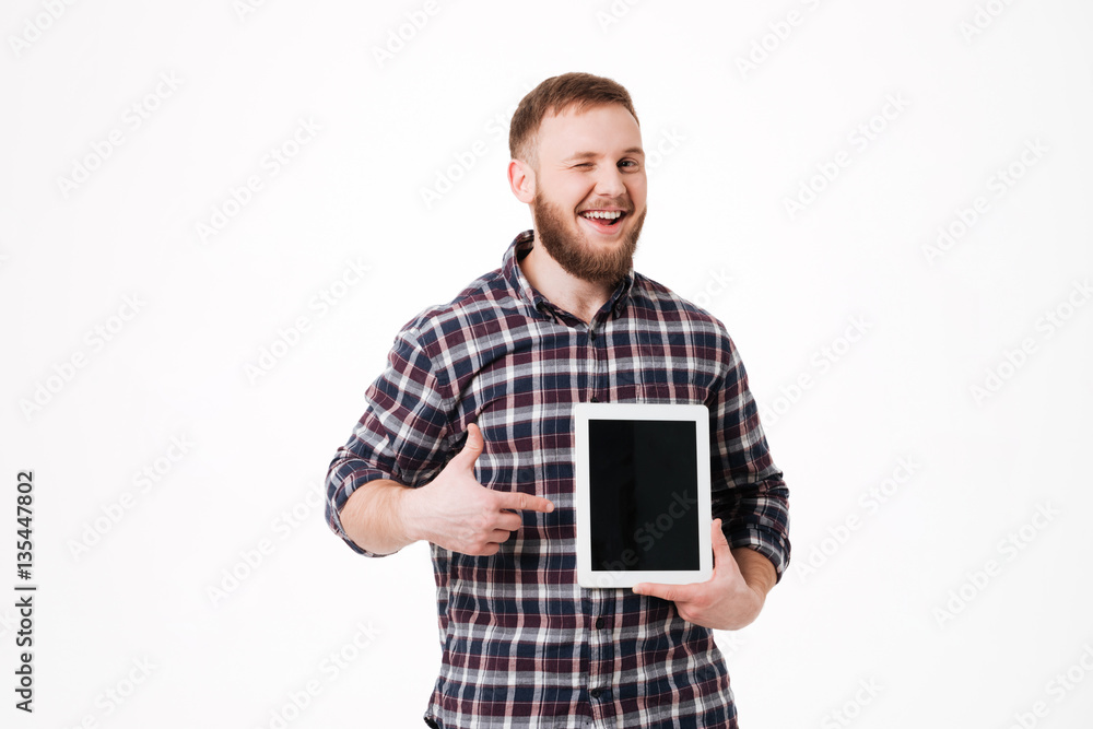 Smiling Man in shirt showing blank tablet computer screen Smiling Man in shirt showing blank tablet computer screen