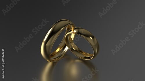 The beauty gold wedding rings on black background. 3d rendering