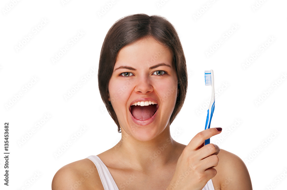 Woman with toothbrush smiling, isolated over white background. Woman with toothbrush smiling, isolated over white background.