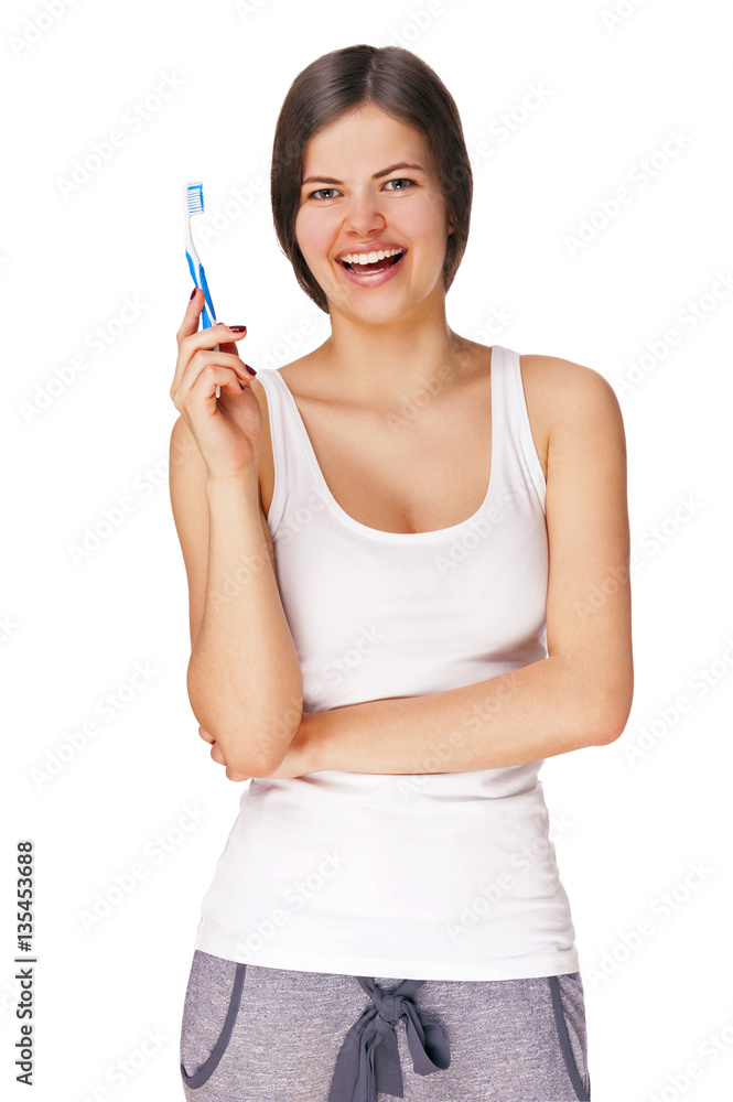 Beautiful smiling woman cleaning her teeth with a toothbrush in Beautiful smiling woman cleaning her teeth with a toothbrush in