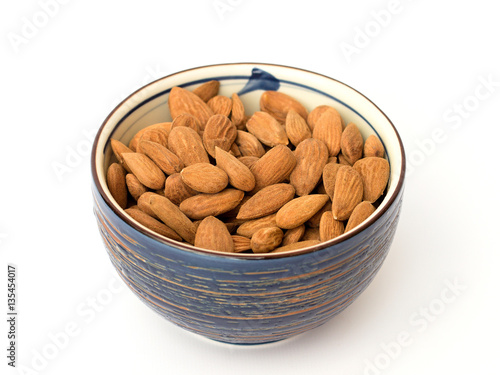fresh almonds on a white background