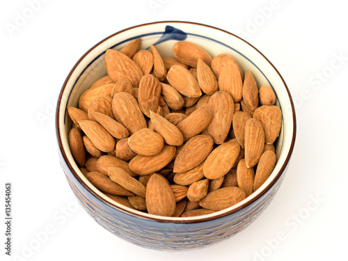 fresh almonds on a white background
