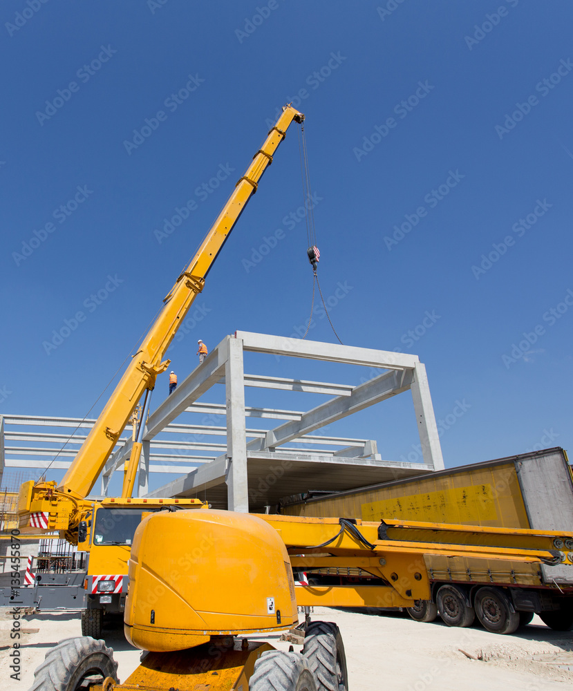 Crane working on construction site Crane working on construction site