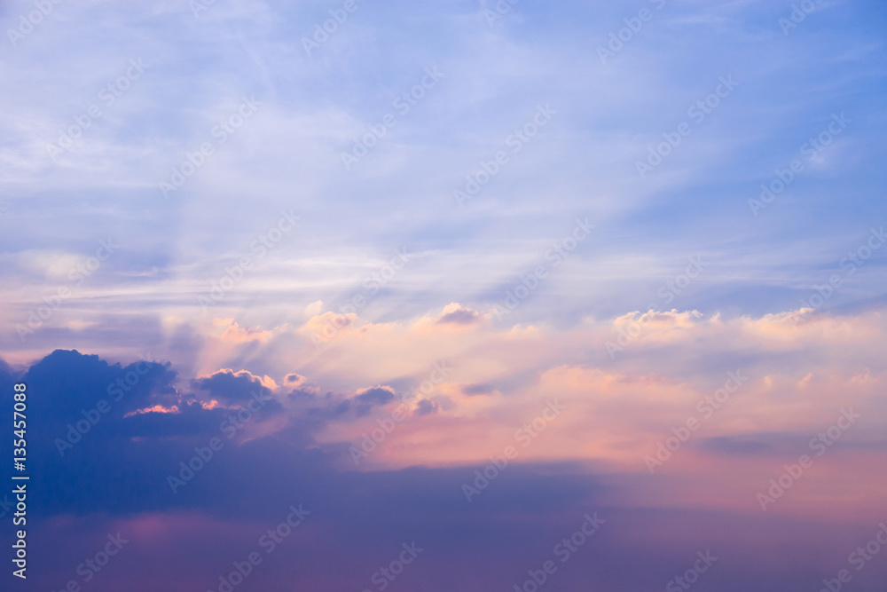 sunset/sunrise sky with light beam pass clouds and sky backgroun