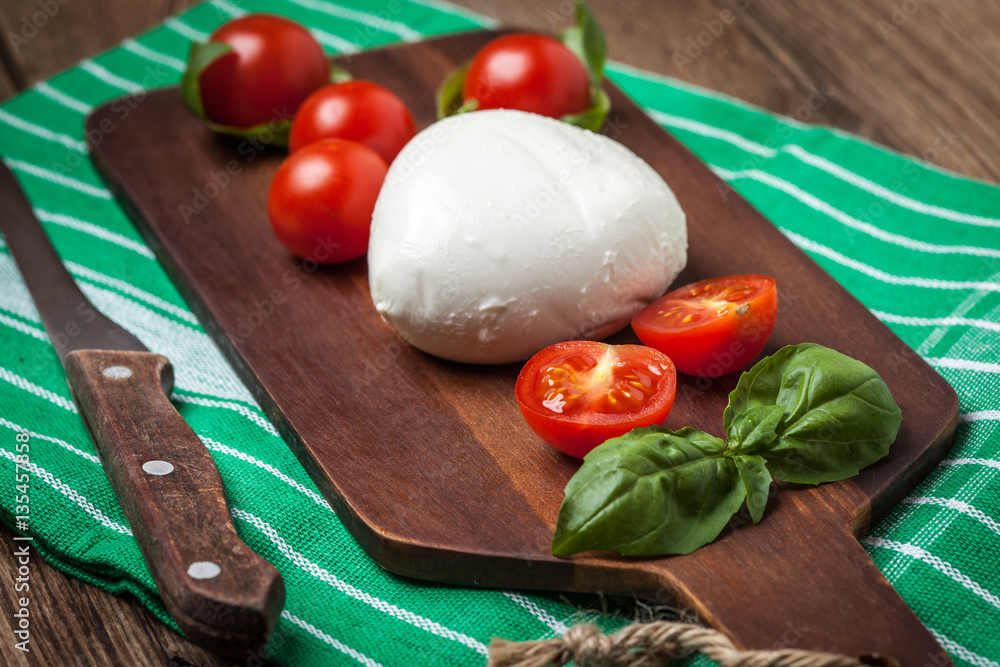 Mozzarella, tomato and basil. Mozzarella, tomato and basil.