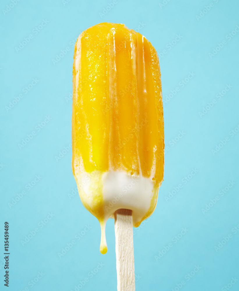 Yellow ice lolly dripping Stock Photo Adobe Stock