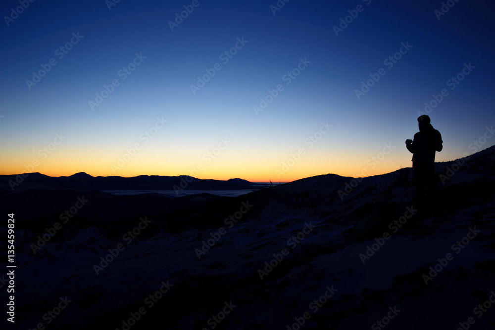 silhouette sunset mountains