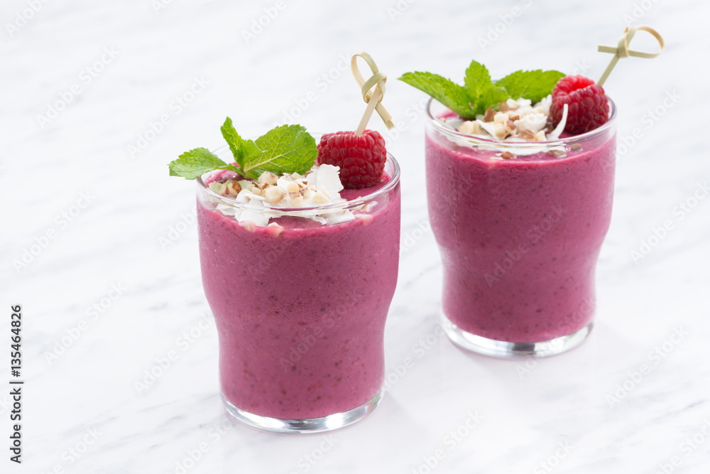 berry smoothie in a glass beakers berry smoothie in a glass beakers