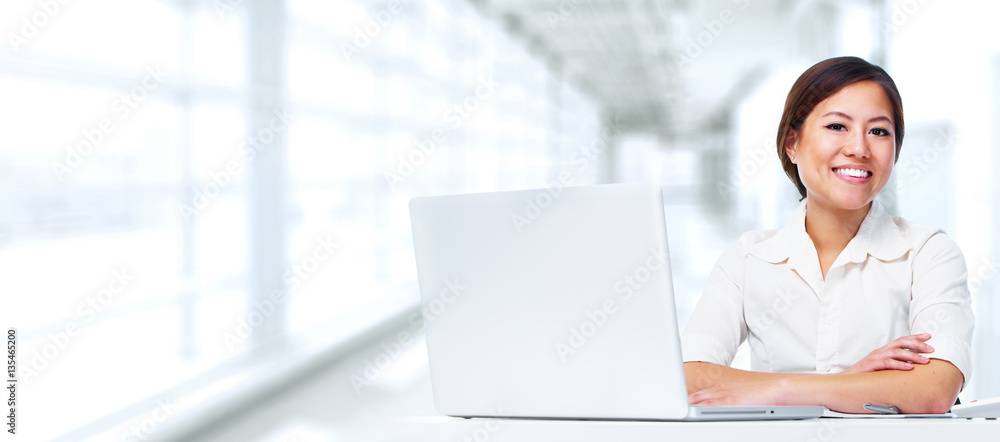 © grinny - Business woman with laptop. © grinny - Business woman with laptop.
