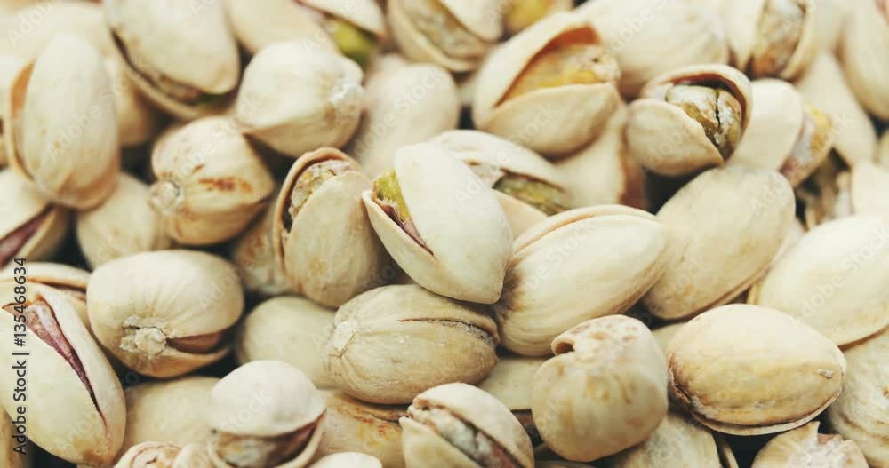 Dried roasted salted appetizing pistachios rotating Dried roasted salted appetizing pistachios rotating