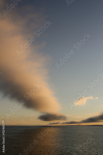 Low clouds over the sea at sunset © Mihai