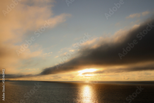 Low clouds over the sea at sunset