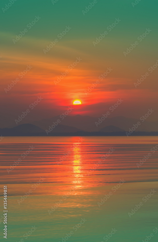 Beautiful sunset above the sea. Vintage tone