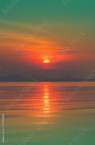 Beautiful sunset above the sea. Vintage tone © nuttawutnuy