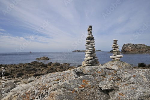 stone towers in front of the sea