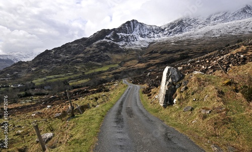 small road in Killarney mountains with snow