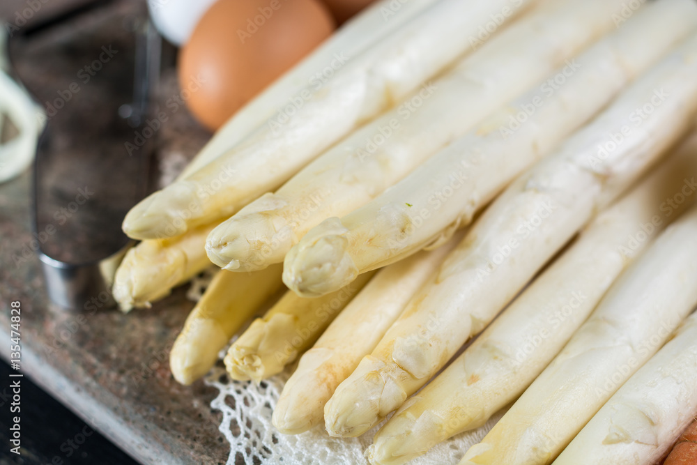Spring season - fresh white uncooked asparagus Spring season - fresh white uncooked asparagus