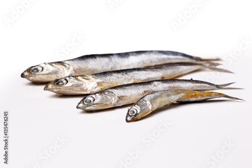 Anchovy from the Black sea - salted small fish lying on a white
