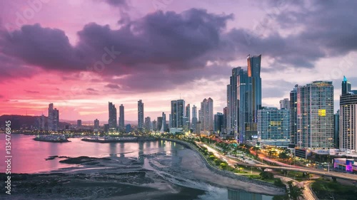 time lapse of panama city skyline from day to night aerial view photo