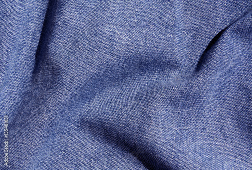 Blue color denim cloth texture.