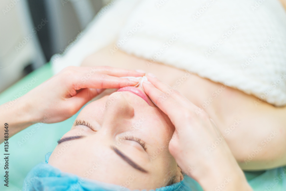 Woman receiving cleansing therapy