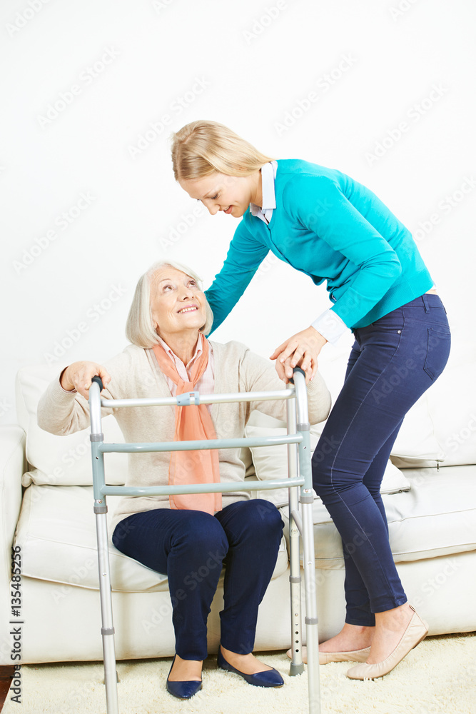 Fototapeta premium Granddaughter caring for grandmother